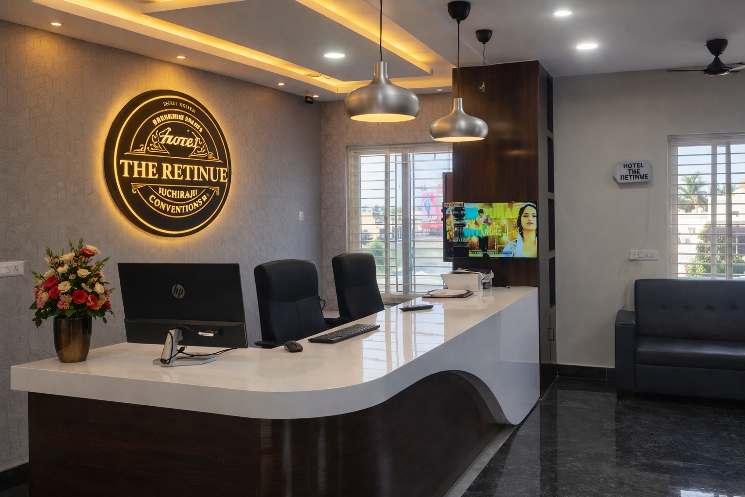 Hotel The Retinue - Elegant lobby with modern reception desk